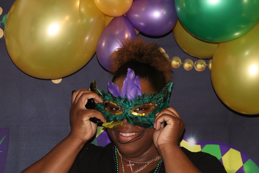 shantaya joyner at banquet holding mask